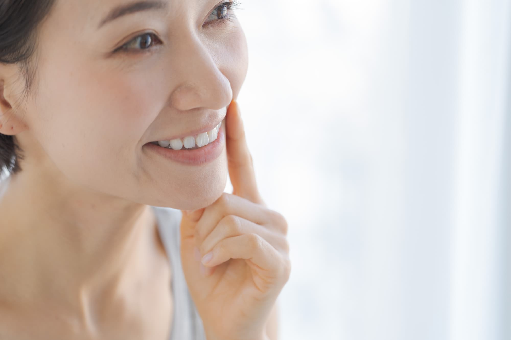 虫歯の無い健康なお口を維持する女性